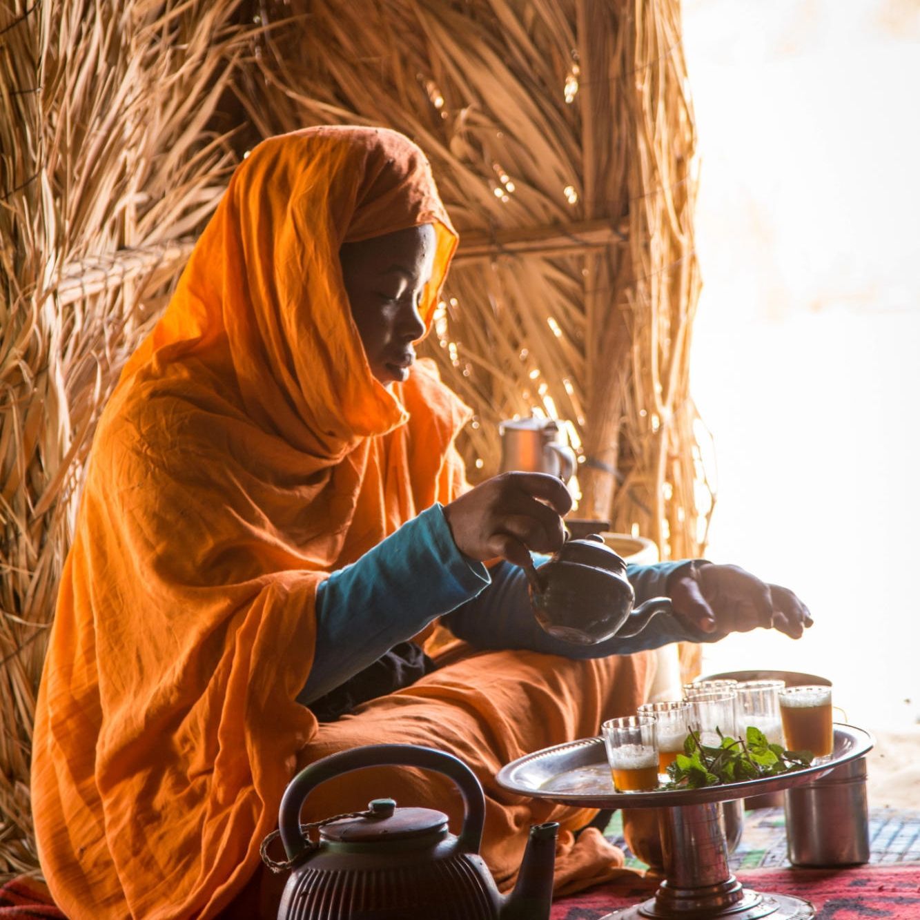 Experience local culture and tea ceremonies. Share sweet, mint-infused Mauritanian tea with local hosts, a deeply rooted tradition symbolizing hospitality, patience, and community.
