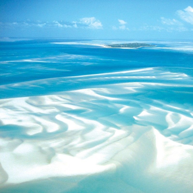 Gaze upon the majestic Bazaruto Archipelago in Mozambique with this breathtaking aerial photo. The scene stretches into what seems like an endless horizon, defined by striking sandbanks emerging from the shallow, turquoise water at low tide. This is a truly untouched marine paradise. Inspiration Africa specializes in organizing tailor-made luxury travel to Mozambique, offering exclusive access to these remote islands and pristine beaches. Discover the magic of the Bazaruto sandbanks and unparalleled diving and relaxation with us.