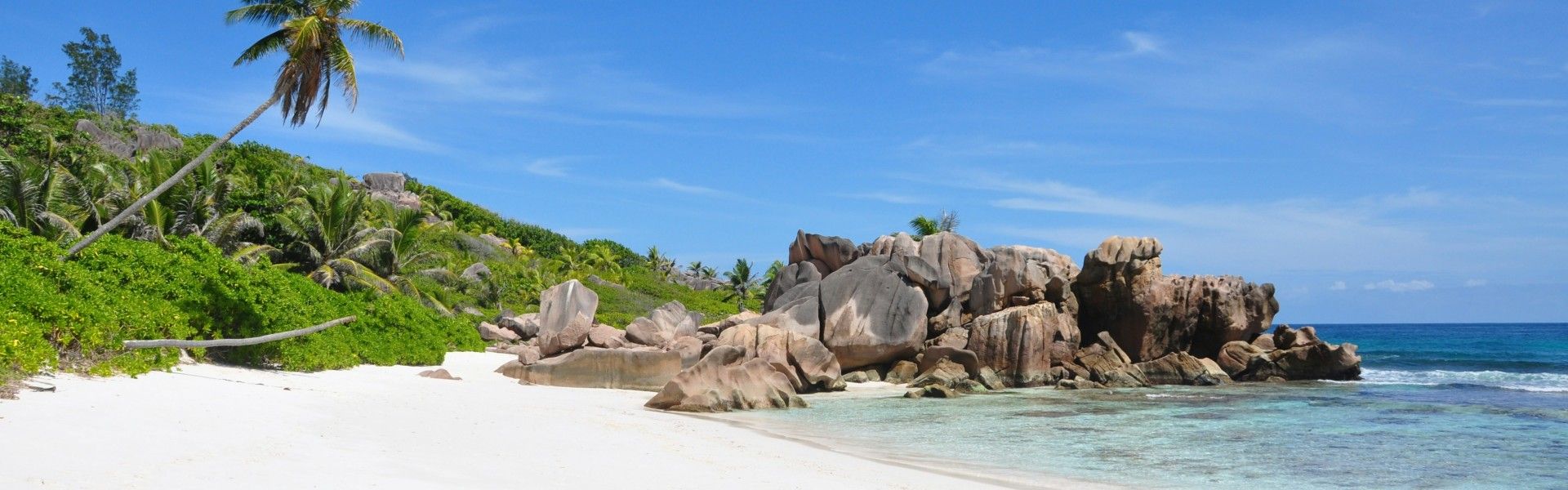 Coco Bay on La Digue Island in the Seychelles is a serene and secluded beach known for its stunning granite boulders and crystal-clear waters. Nestled on the island’s northeastern coast, this hidden gem is perfect for snorkeling, offering a vibrant underwater world of coral reefs and marine life. Its peaceful atmosphere and natural beauty make Coco Bay an ideal spot for those seeking tranquility and a connection with nature, away from the more frequented areas of La Digue. Visitors often reach Coco Bay by bike or boat, adding to its sense of seclusion.
