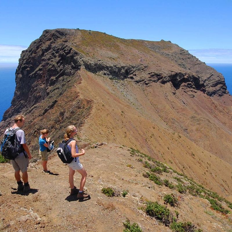 St. Helena is a hiker’s paradise, offering diverse trails that lead through rugged landscapes, lush valleys, and dramatic coastal cliffs. Popular hikes include ascending Diana’s Peak, the island’s highest point, with panoramic views and endemic flora, or exploring the volcanic landscapes of Sandy Bay. Trails also take hikers to historical landmarks like Jacob’s Ladder, with its 699 steps, and Napoleon’s Tomb, set in a serene valley. Whether it’s a leisurely walk or a challenging trek, hiking in St. Helena provides a rewarding way to experience the island’s unique natural beauty and history.