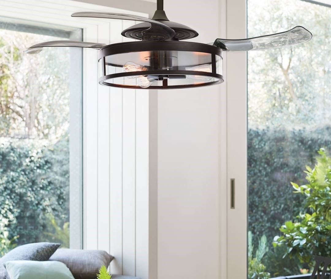 A Ceiling Fan Is Hanging From The Ceiling In A Living Room — Joyner Electrical Pty Ltd In Carrara, QLD