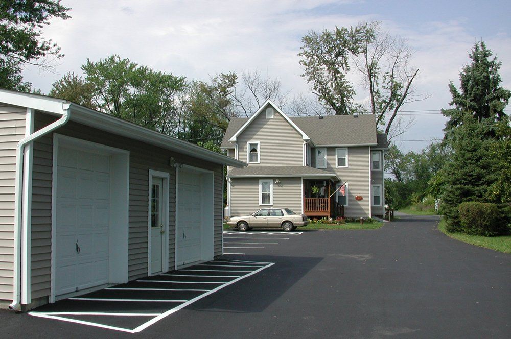 front exterior of 155 Main with garages