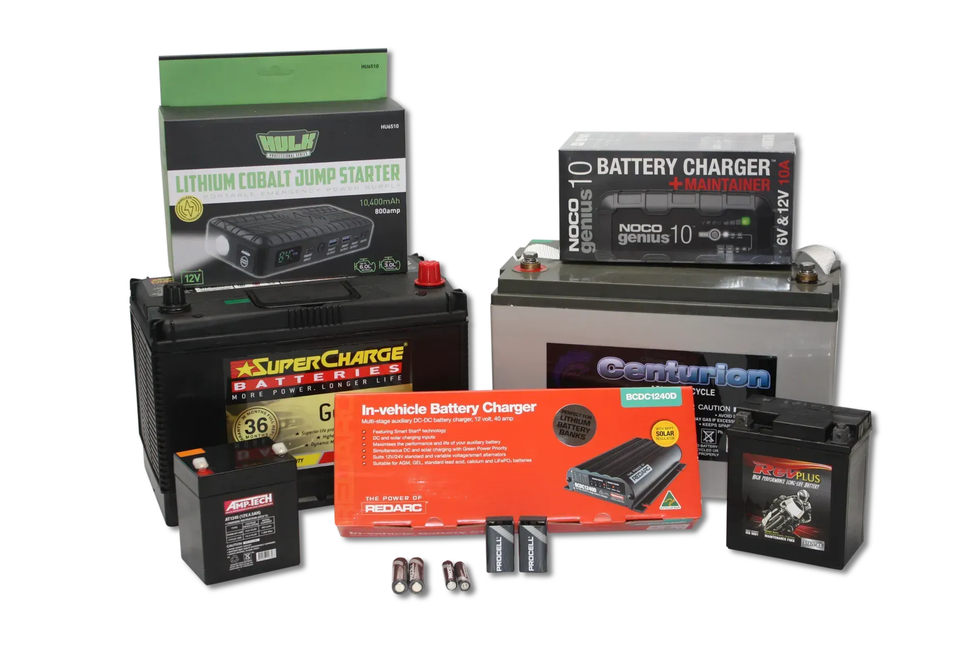 A Group of Batteries and Chargers Are Sitting on Top of Each Other on a Table — Rainbow Beach 4x4 Accessories in Rainbow Beach, QLD