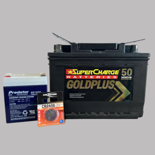 Black car battery, small battery, and button cell battery on white. — Rainbow Beach 4x4 Accessories in Rainbow Beach, QLD