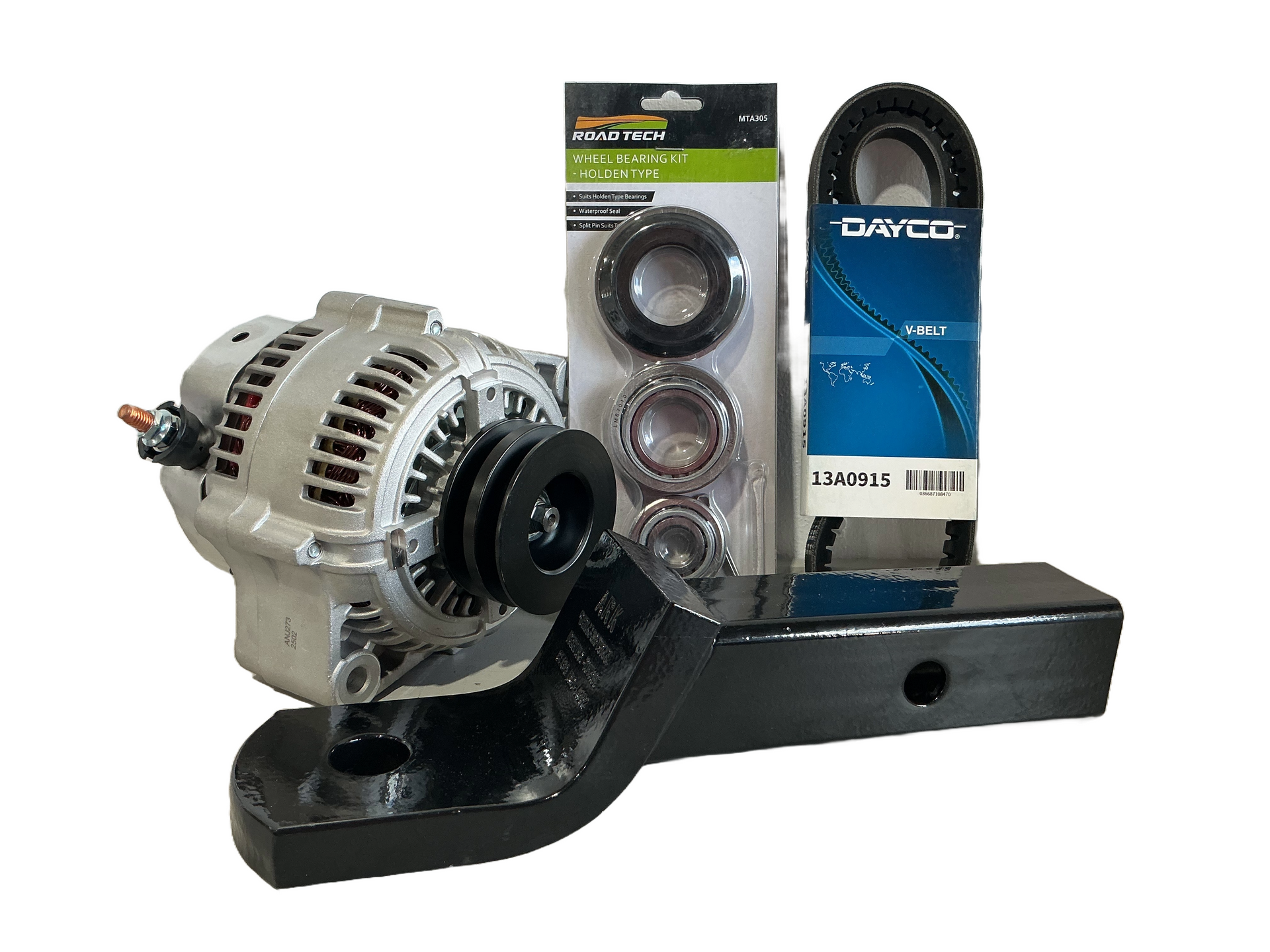 An alternator, bearings, and a belt are on top of a black trailer hitch, against a white background. — Rainbow Beach 4x4 Accessories in Rainbow Beach, QLD