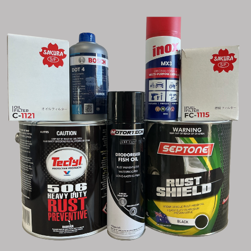 Assorted cans and boxes of rust prevention and other chemicals, including paint and lubricant.— Rainbow Beach 4x4 Accessories in Rainbow Beach, QLD
