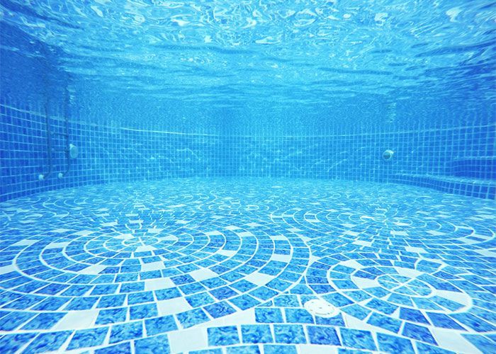 A Underwater View of an Empty Swimming Pool With Blue Tiles — Dunckers in Nambour, QLD