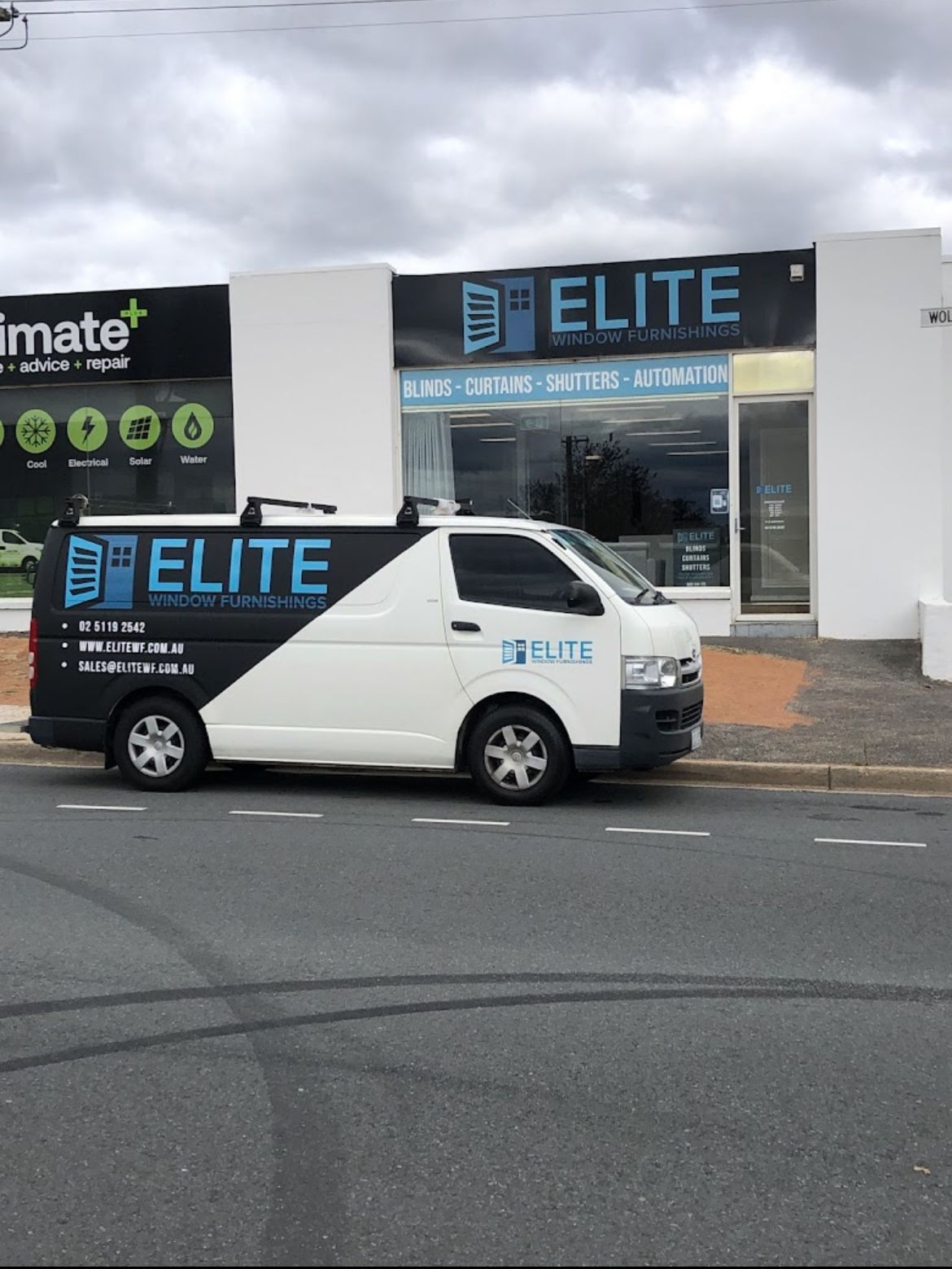 A White Car With the Word Elite on It  — Elite Window Furnishings In Fyshwick, ACT