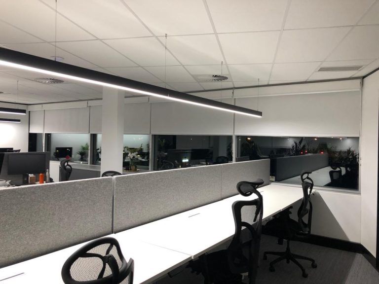 An office with a lot of desks and chairs — Elite Window Furnishings In Fyshwick, ACT