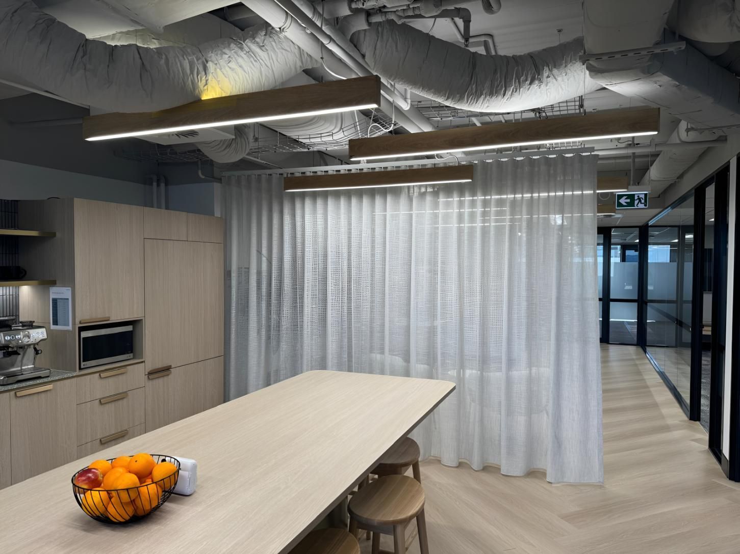 There is a Bowl of Oranges on the Table in the Kitchen — Elite Window Furnishings In Woden, ACT