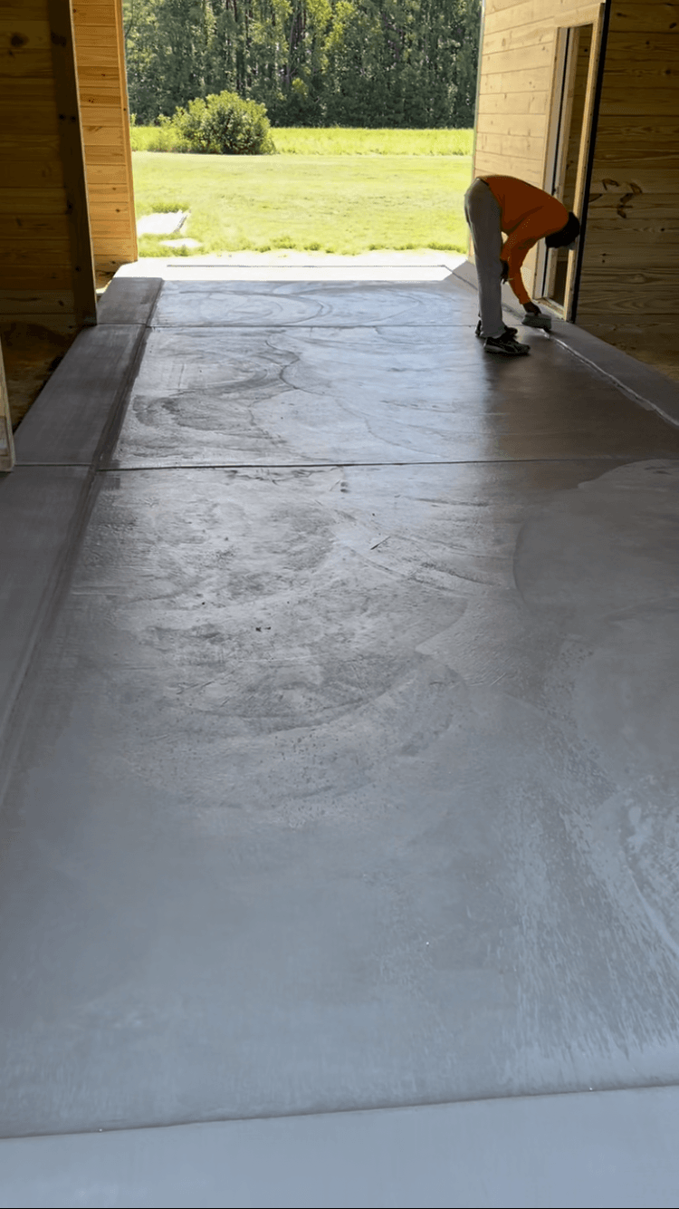 Construction Pouring Cement Using a Concrete Pump Hose