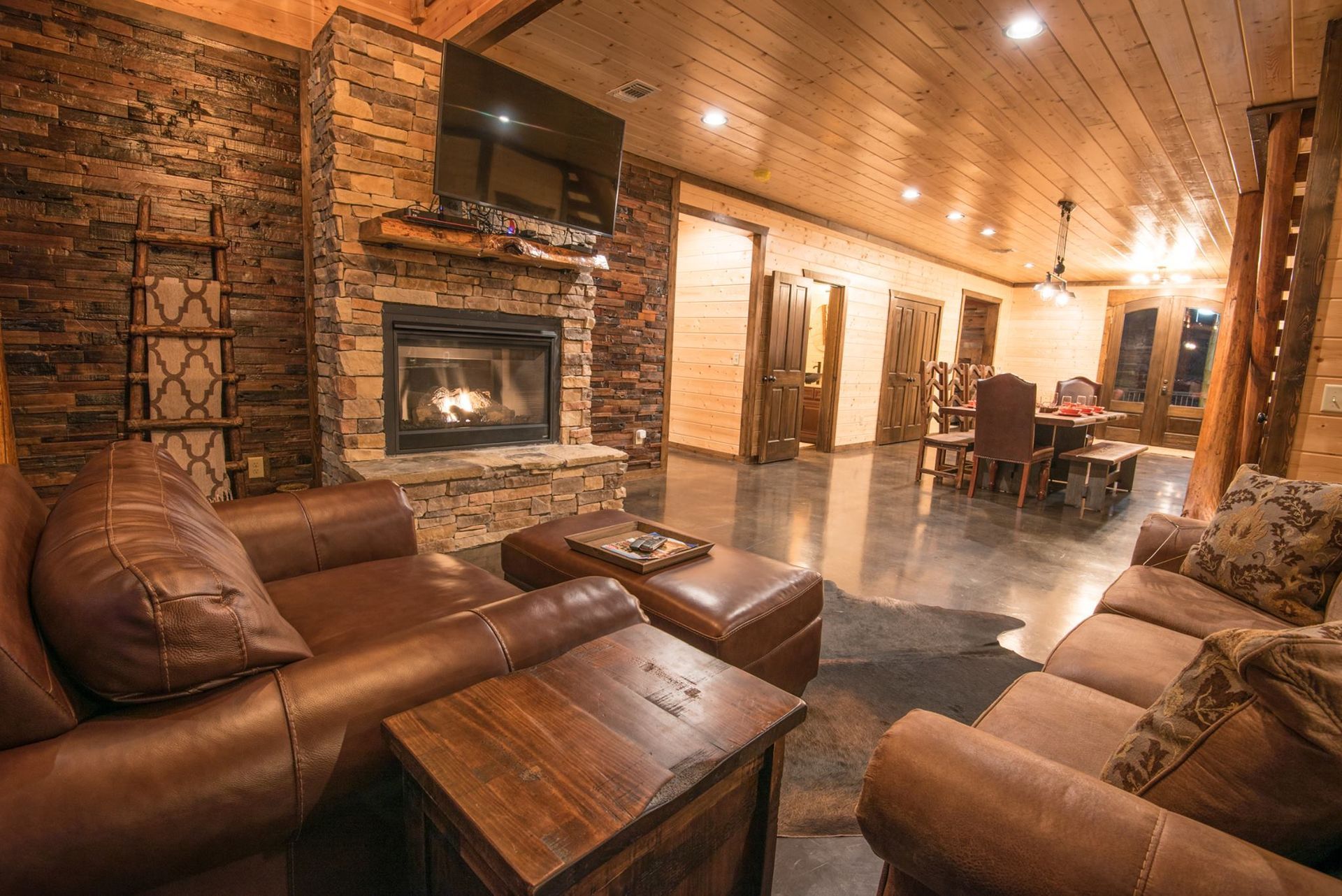 A living room filled with furniture and a fireplace.