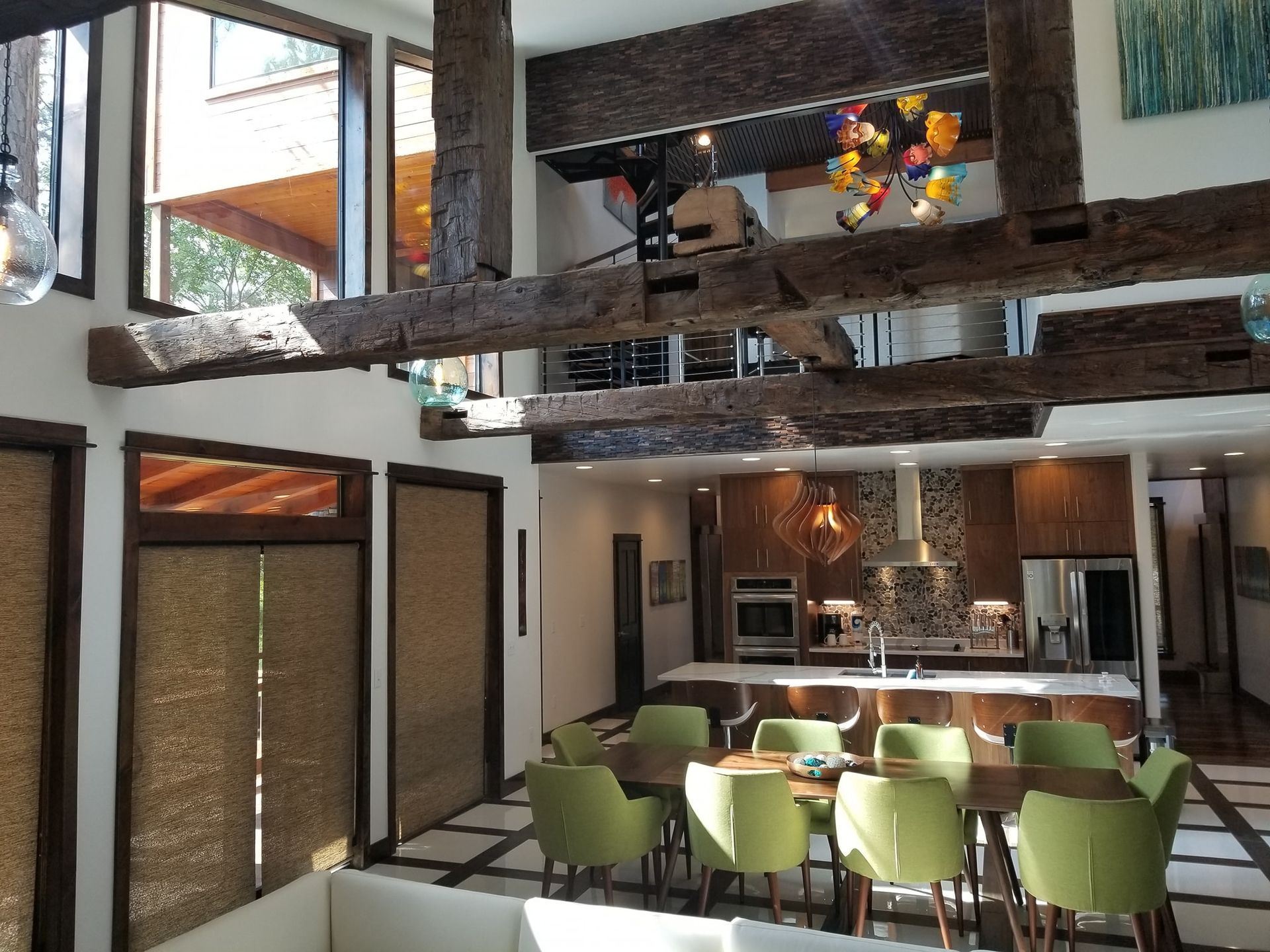 A kitchen with a table and chairs in it