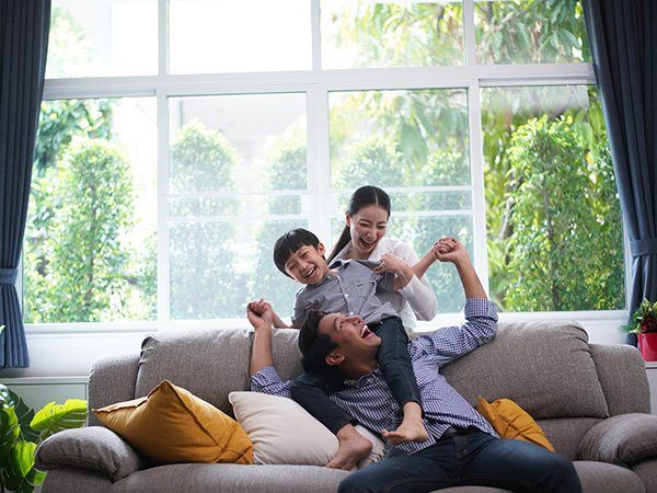 Family Playing Together — Okeechobee, FL — Best Built Homes