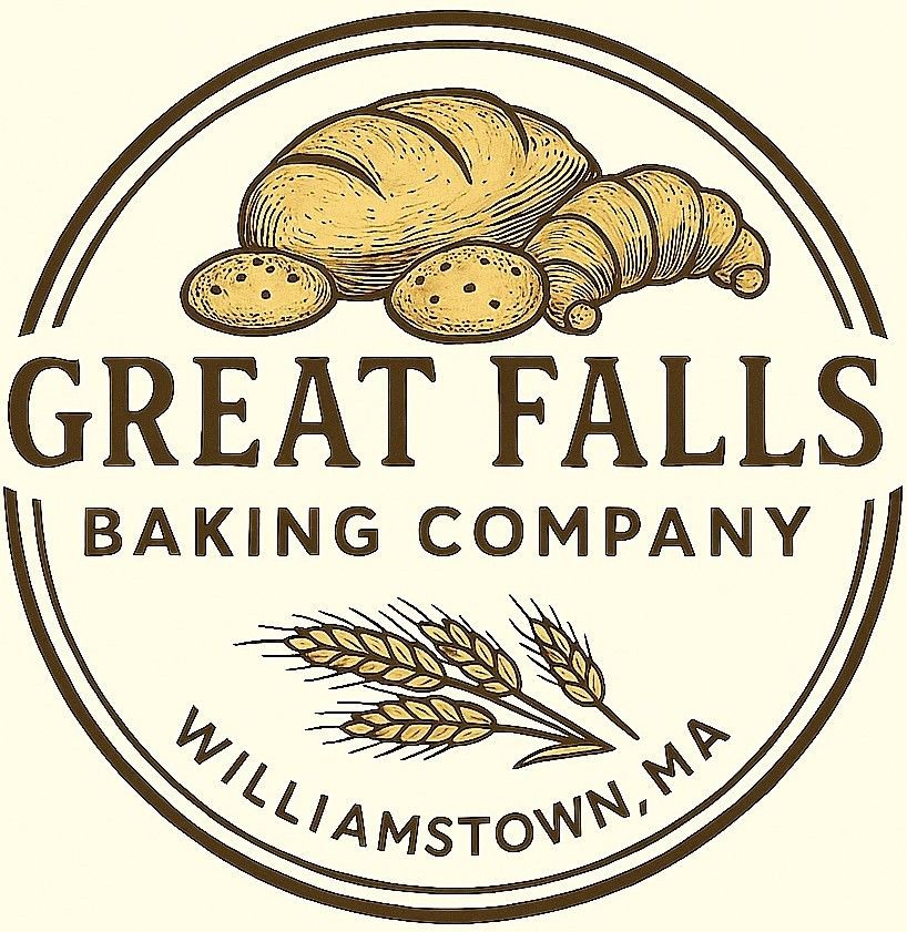 Logo of Great Falls Baking Company: baked goods, wheat stalks, and town name inside a brown circular frame.