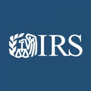 The irs logo is on a blue background