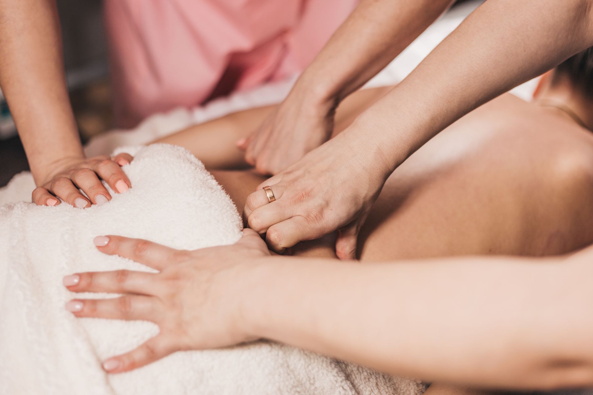 A woman is getting a massage in a spa.