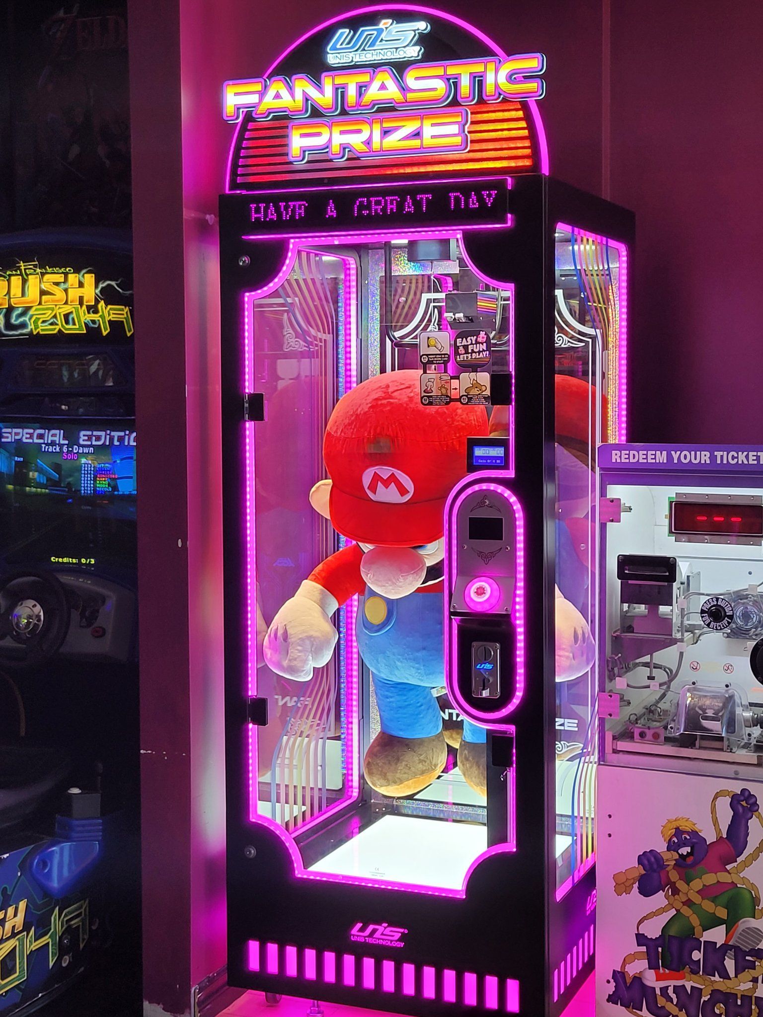 A fantastic prize machine with mario inside of it