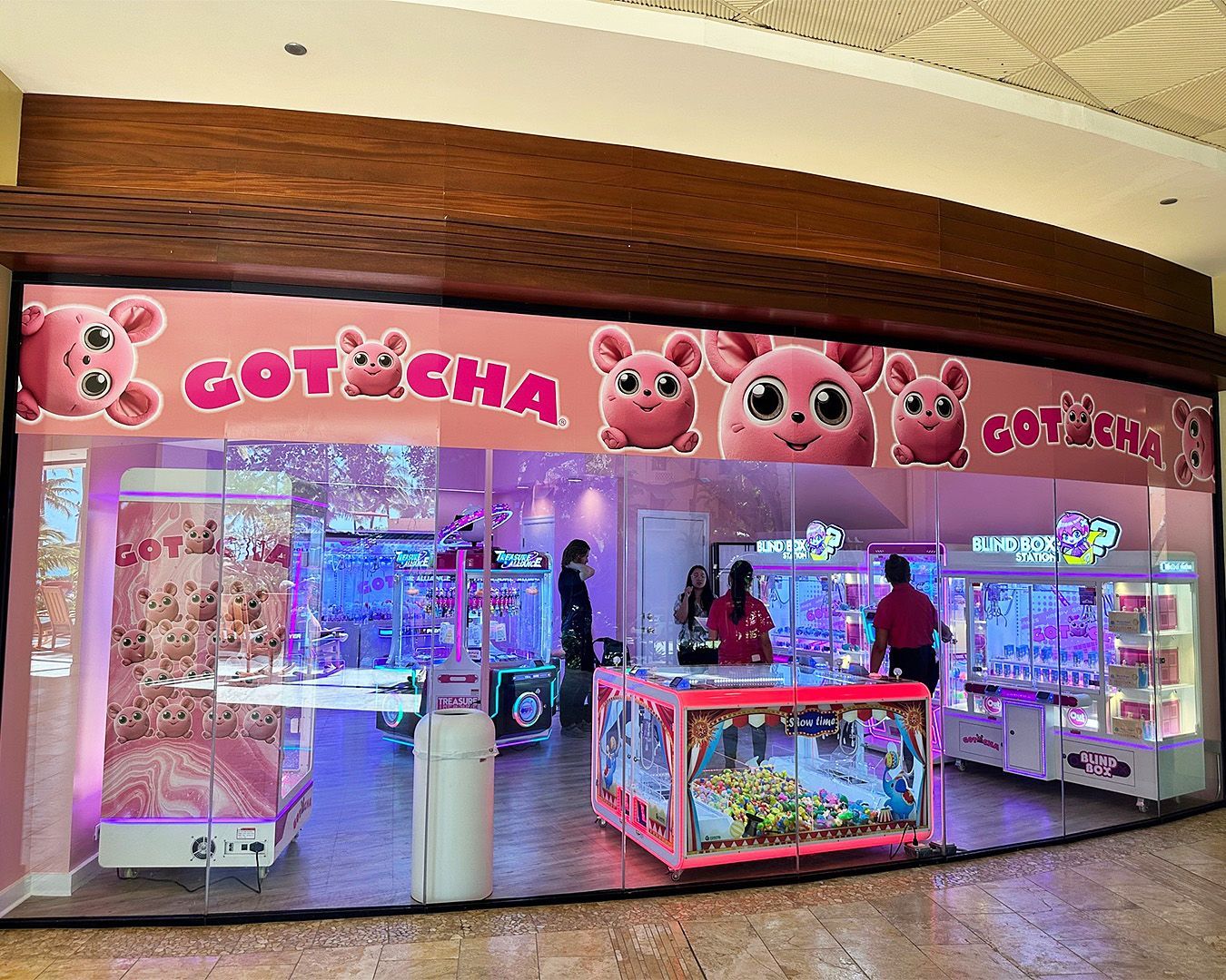 A store front with a sign that says gotcha on it