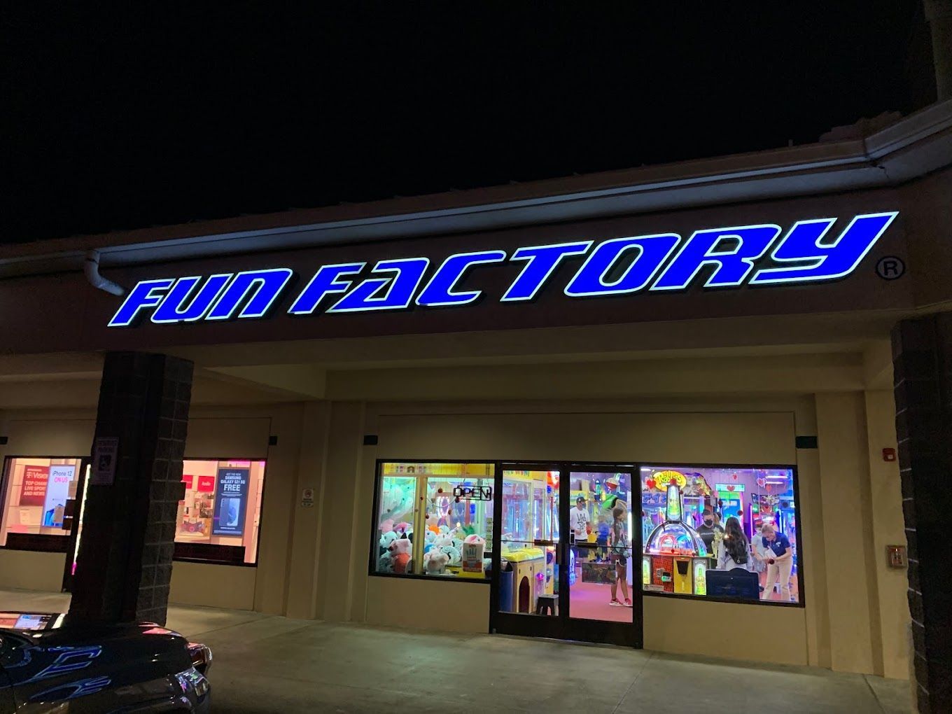 A building with a sign that says fun factory on it
