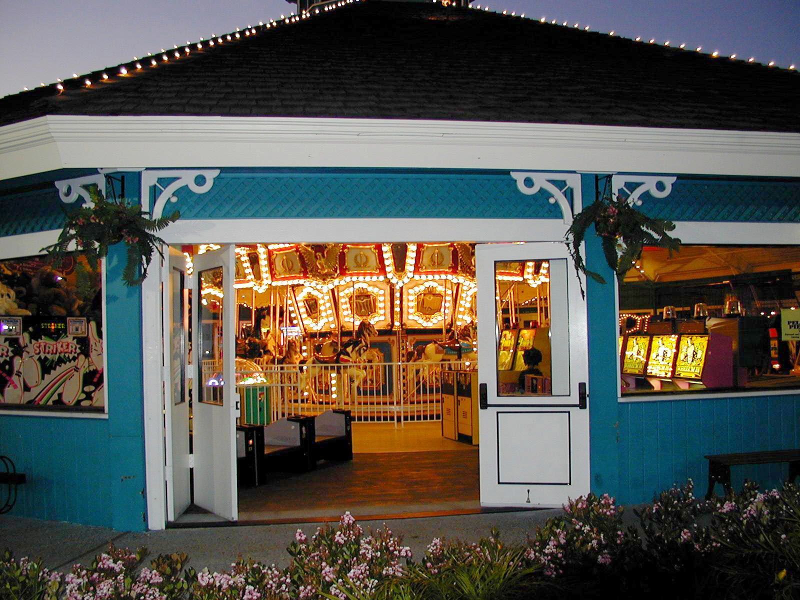 A blue building with a carousel inside of it