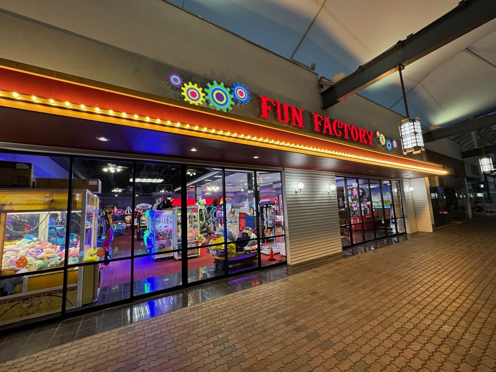 A large building with a sign that says fun factory maui hawaii