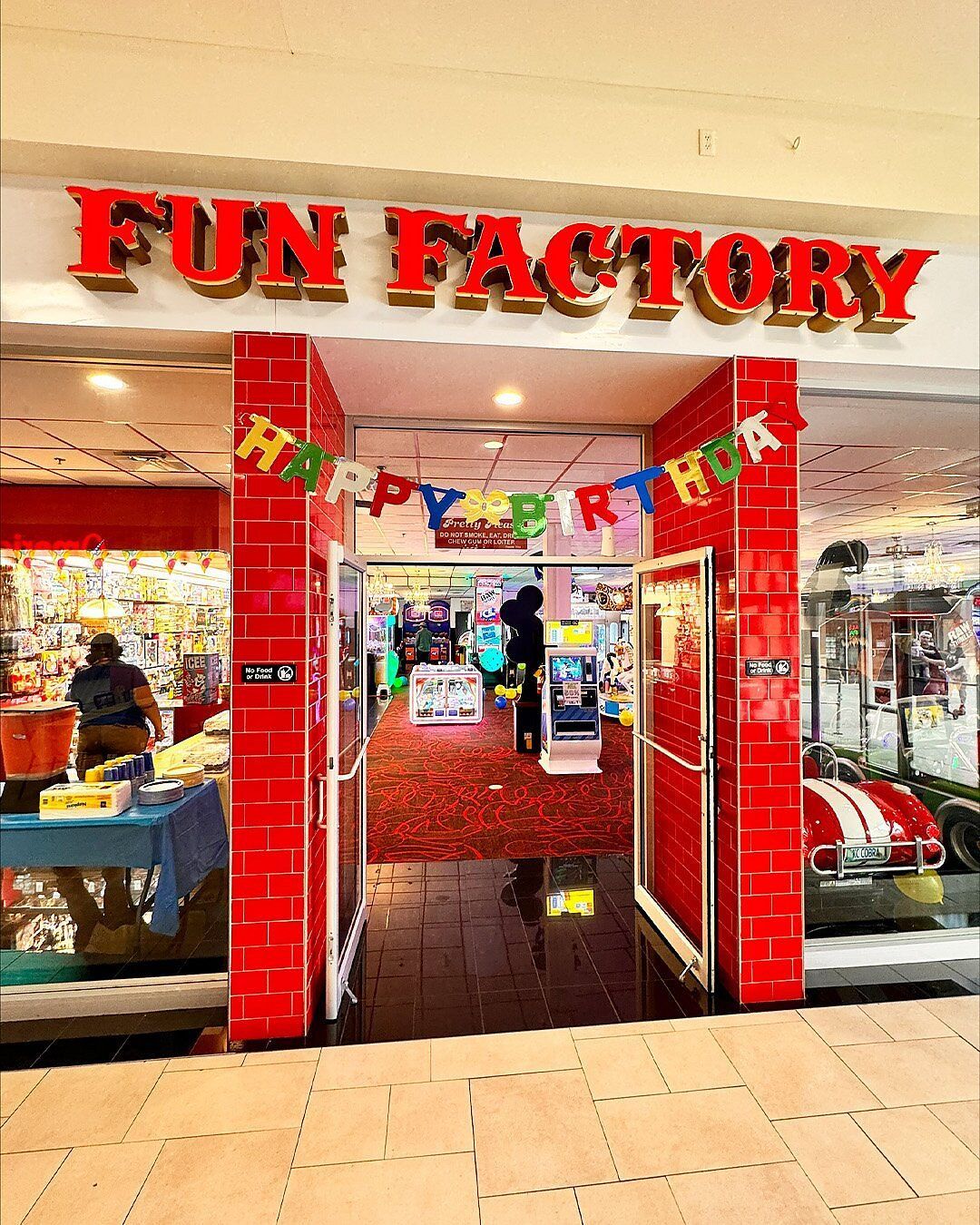 The entrance to the fun factory in a shopping mall.