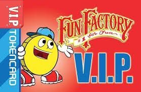 A fun factory vip token card with a smiley face on it.