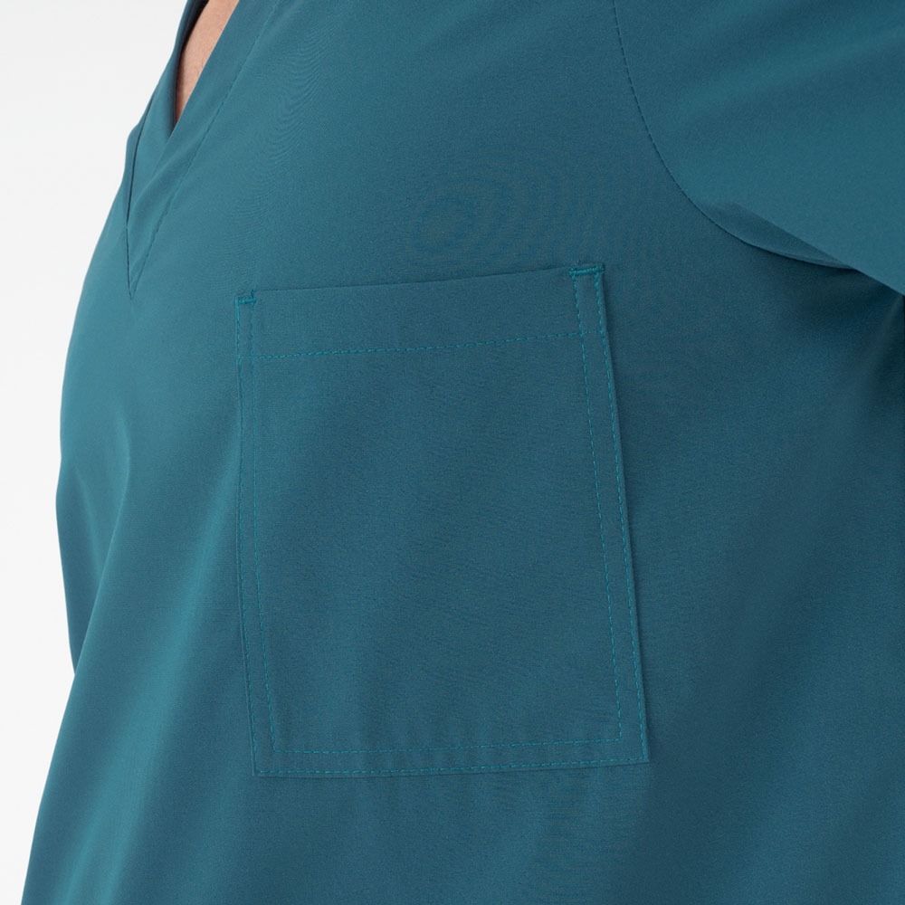 Top color verde acqua con tasca.