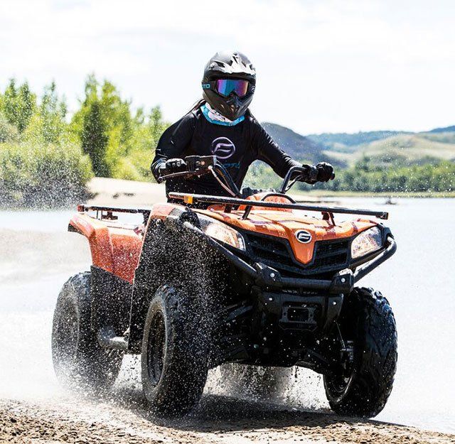 Man With Helmet Driving a Cforce 400 — North Coast Construction Equipment In Grafton, NSW