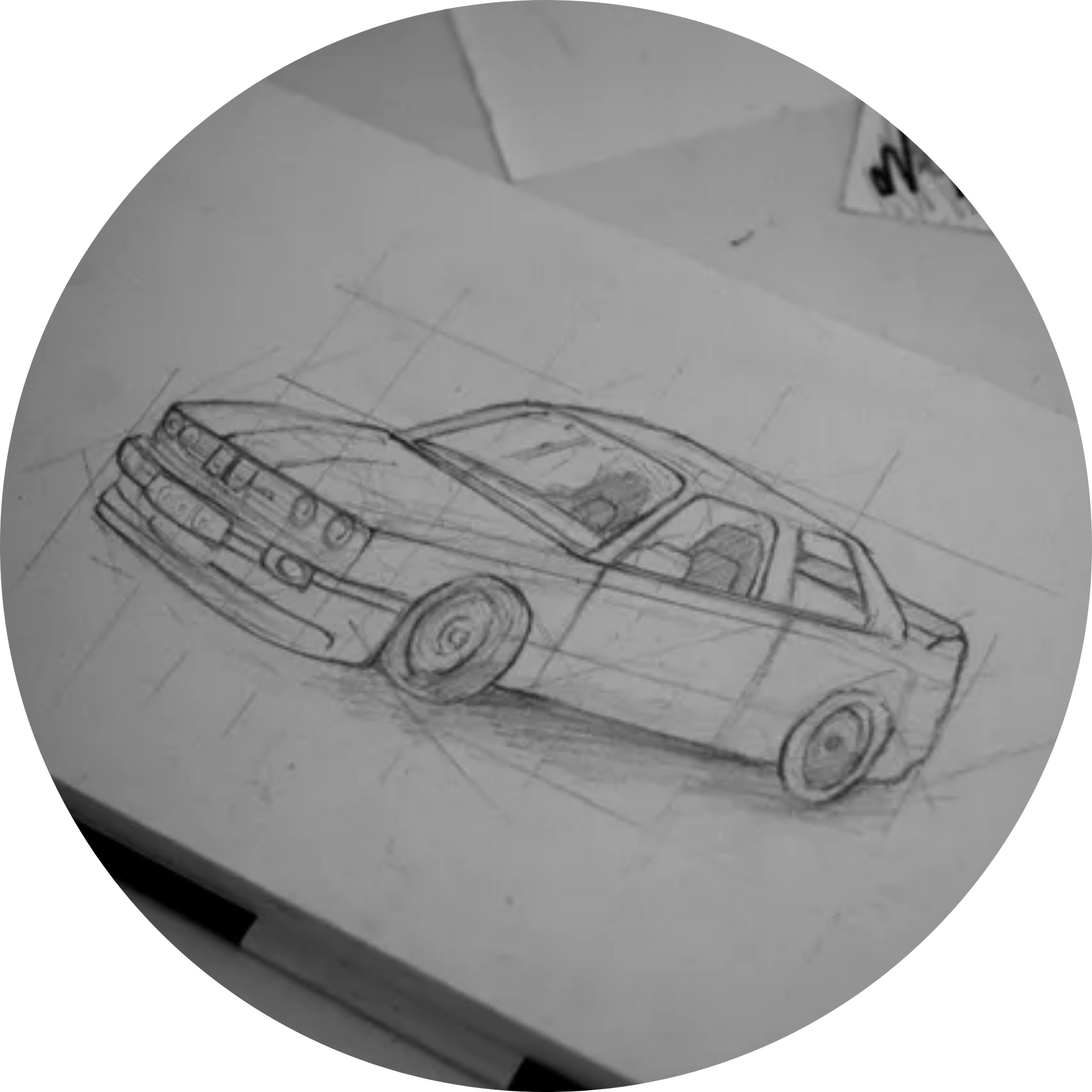 A black and white drawing of a car on a piece of paper.