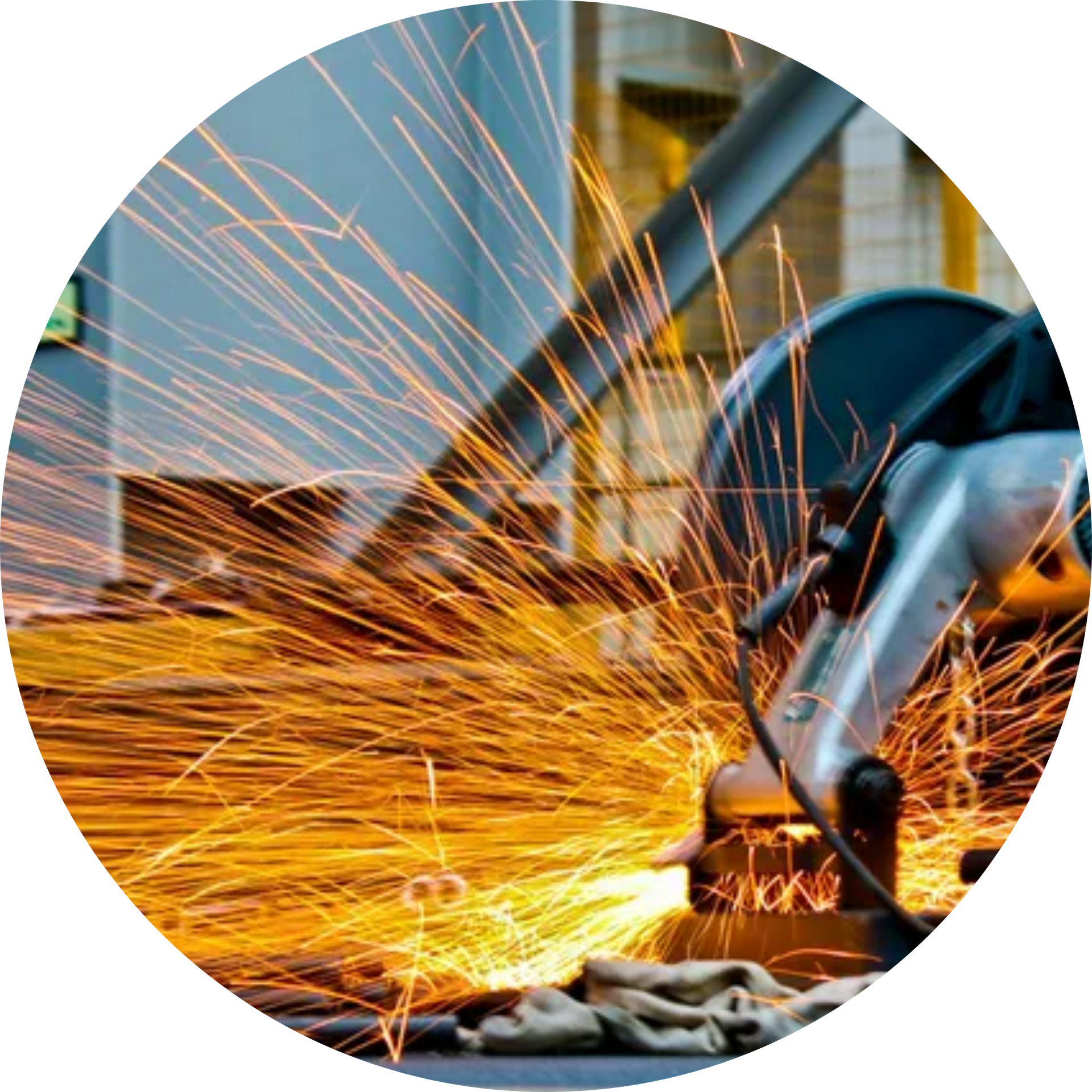 A person is using a grinder to cut a piece of metal.