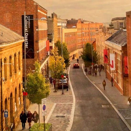 A street with a sign that says cultural quarter on it