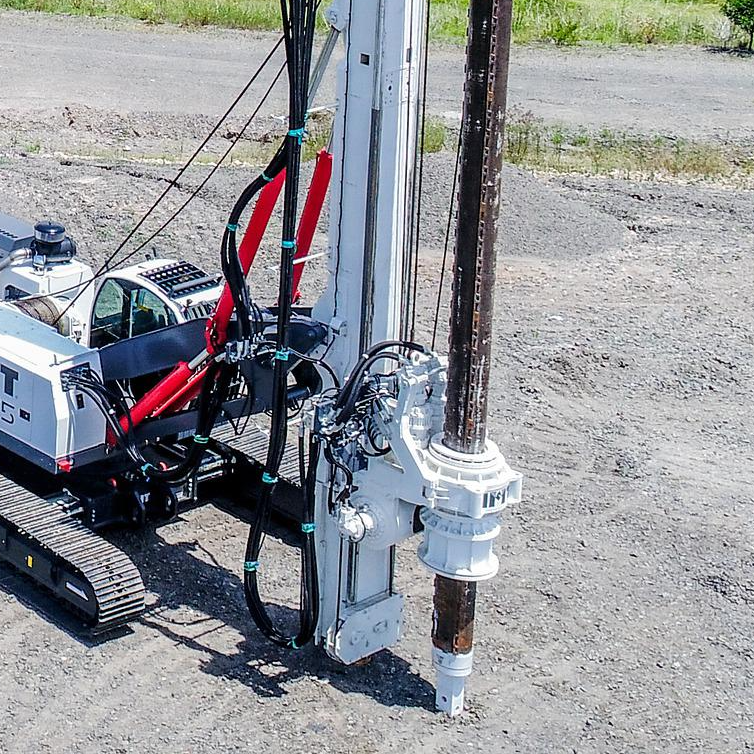 An aerial view of a machine that has the letter t on it