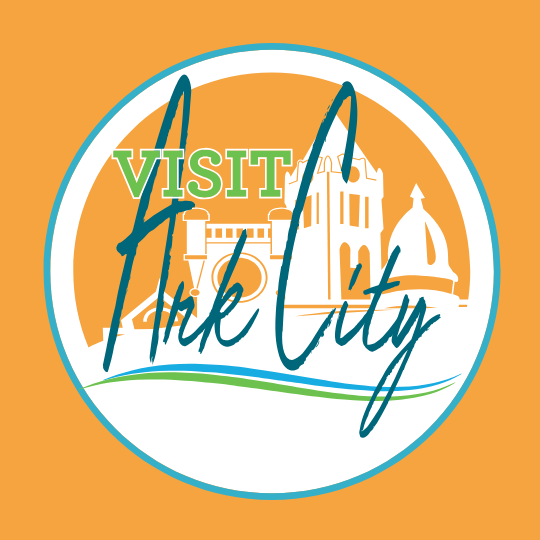 Cherokee Strip Land Rush Museum A logo that says visit ark city on it