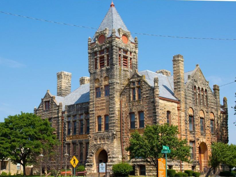 A large stone building with a tower on top of it