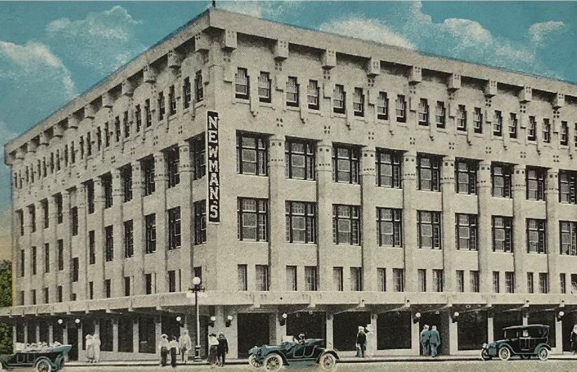 A large building with the word newman's on it