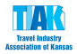 The logo for the travel industry association of kansas is blue and white.
