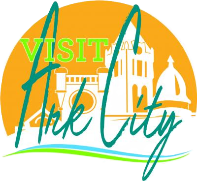 A logo for visit pink city with a castle in the background