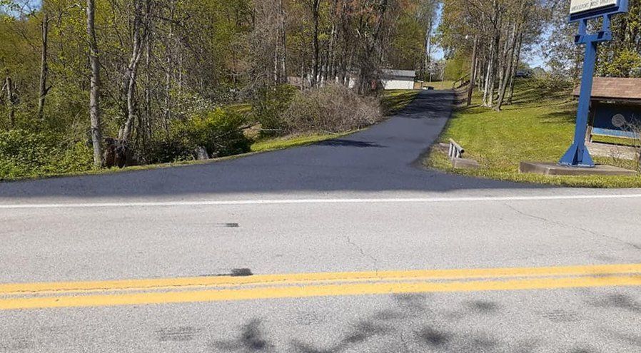 residential asphalt sealcoating, long drivway sealcoating, sealcoating company near memilan pa
