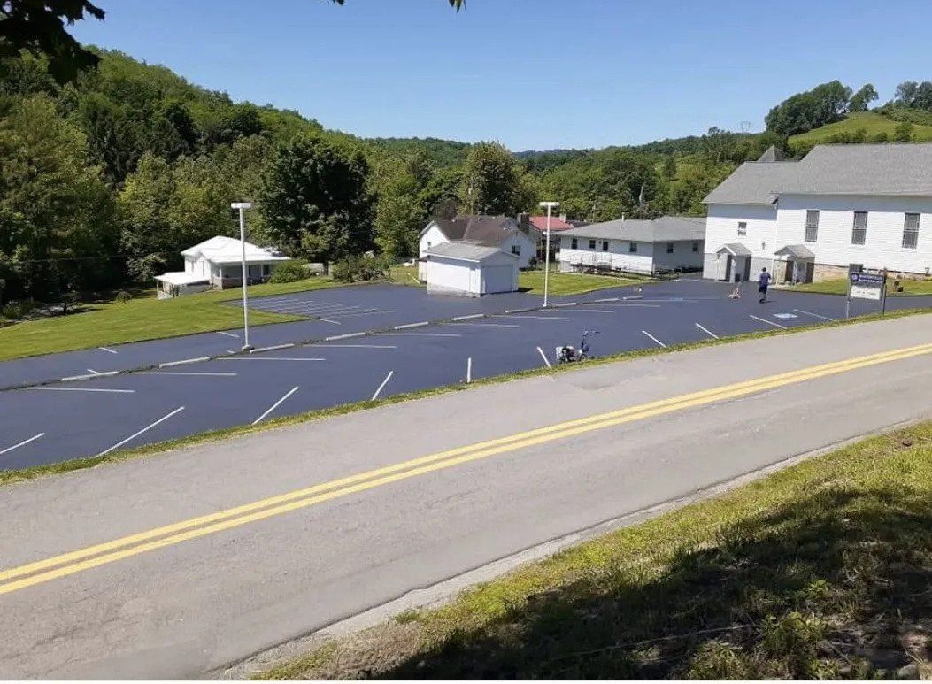 freshly sealcoated road asphalt sealcoating, road and street sealing, milan pa