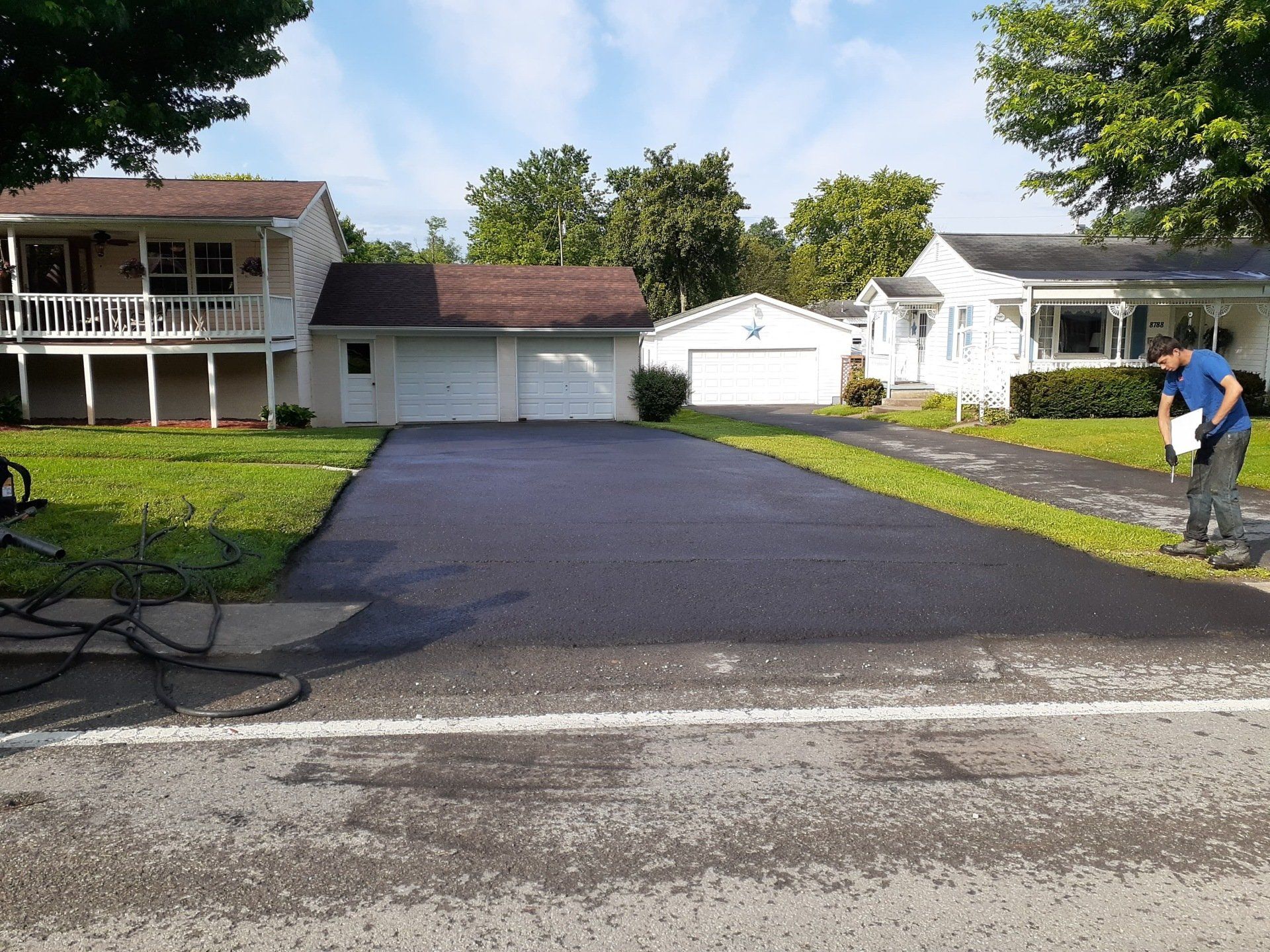 freshly sealcoated driveway, asphalt sealcoating, drivway sealing, milan pa