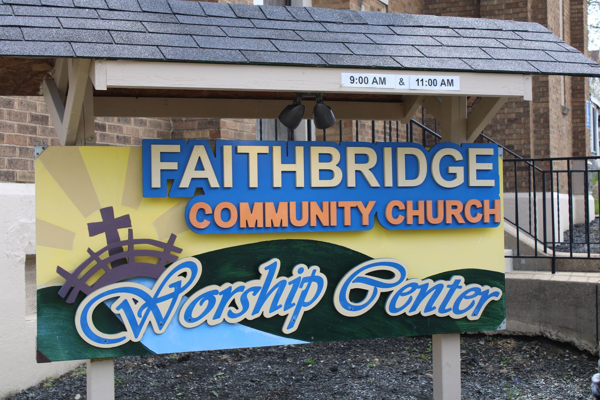 A sign for the faithbridge community church worship center