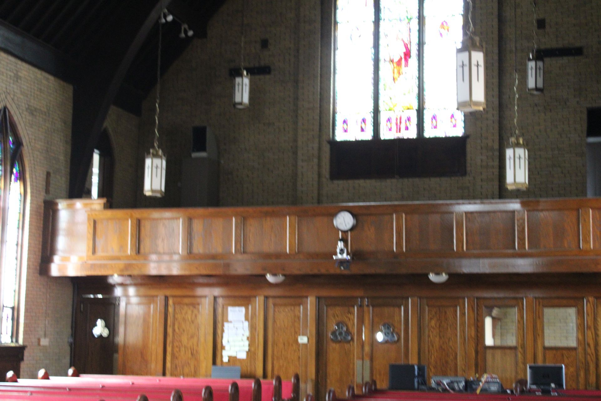 The inside of a church with stained glass windows