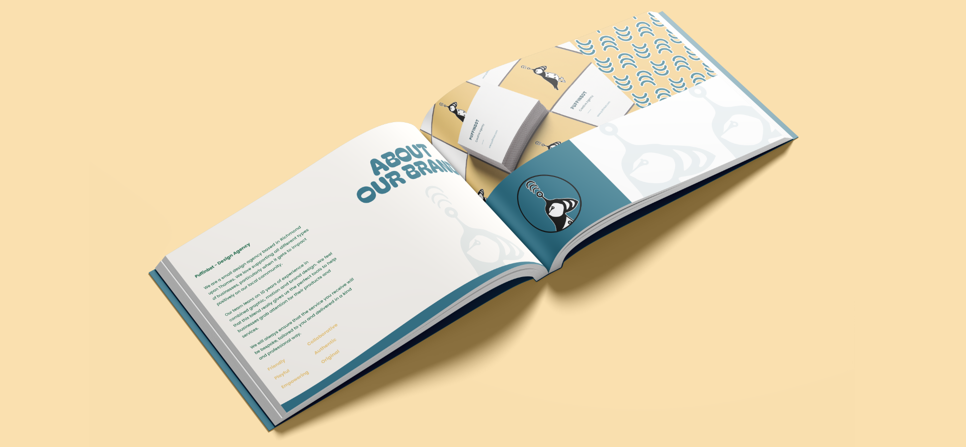 A bespoke brand identity book is open to a page with a picture of a Puffinbot on it.