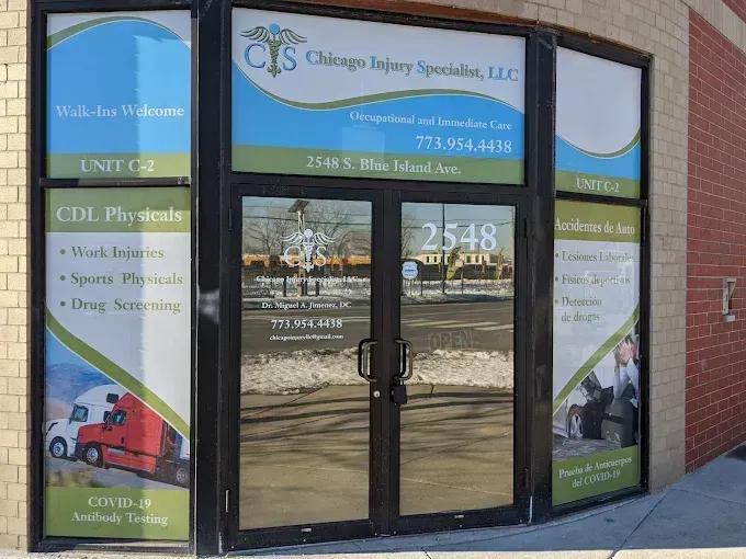 Exterior of Chicago Injury Specialists, LLC, with unit signage for CDL Physicals and Lockup & Go.
