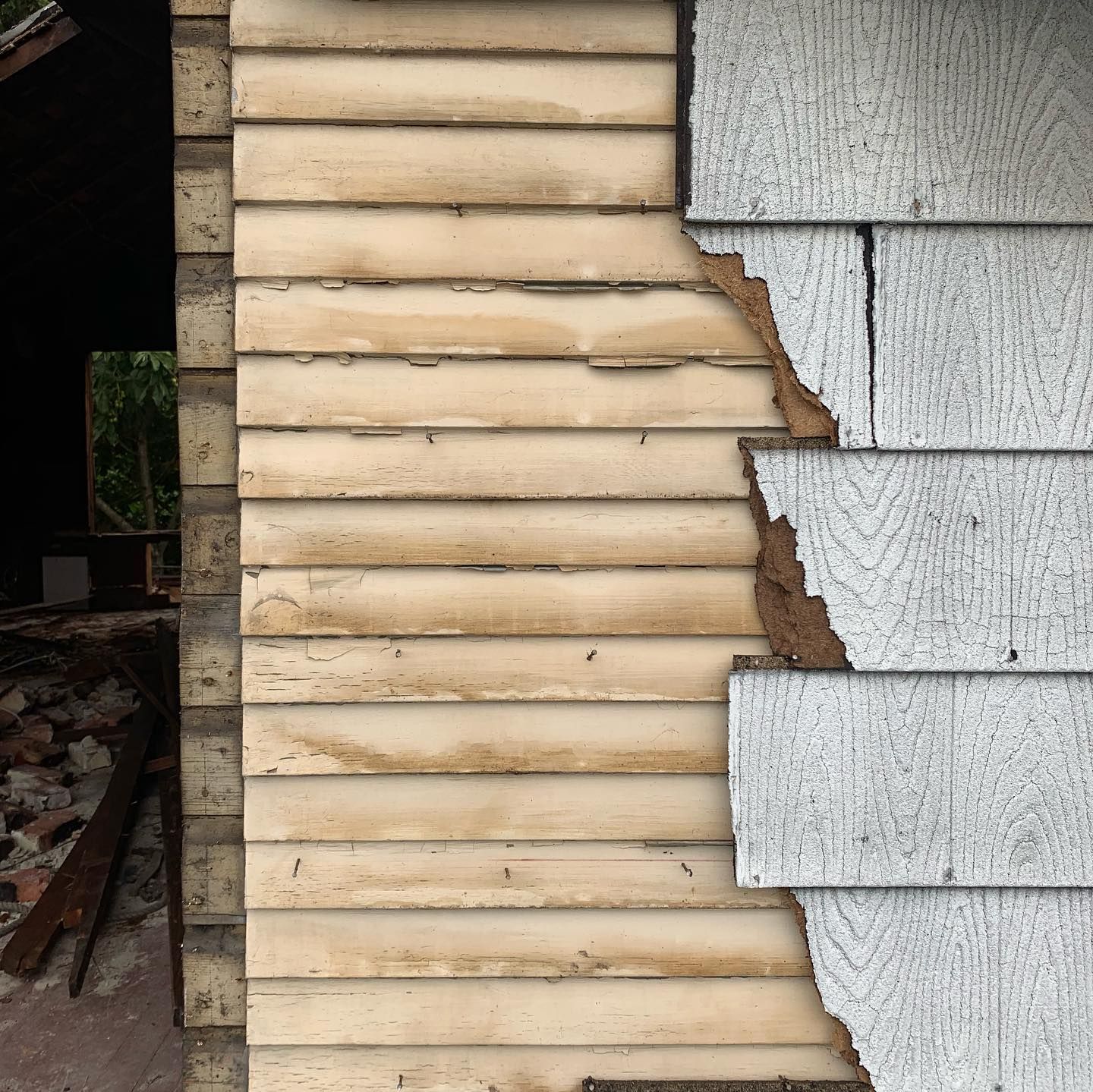 A close up of a wooden siding on a building