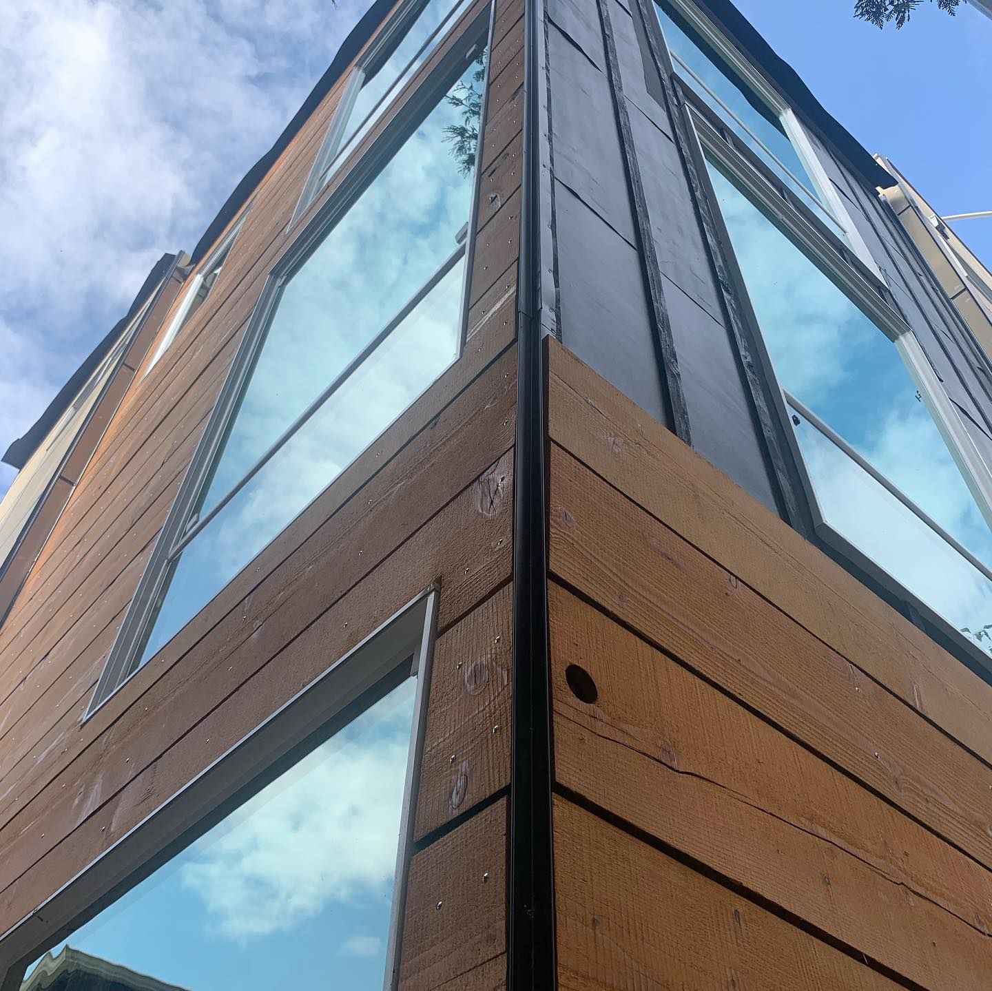 Looking up at a building with a lot of windows