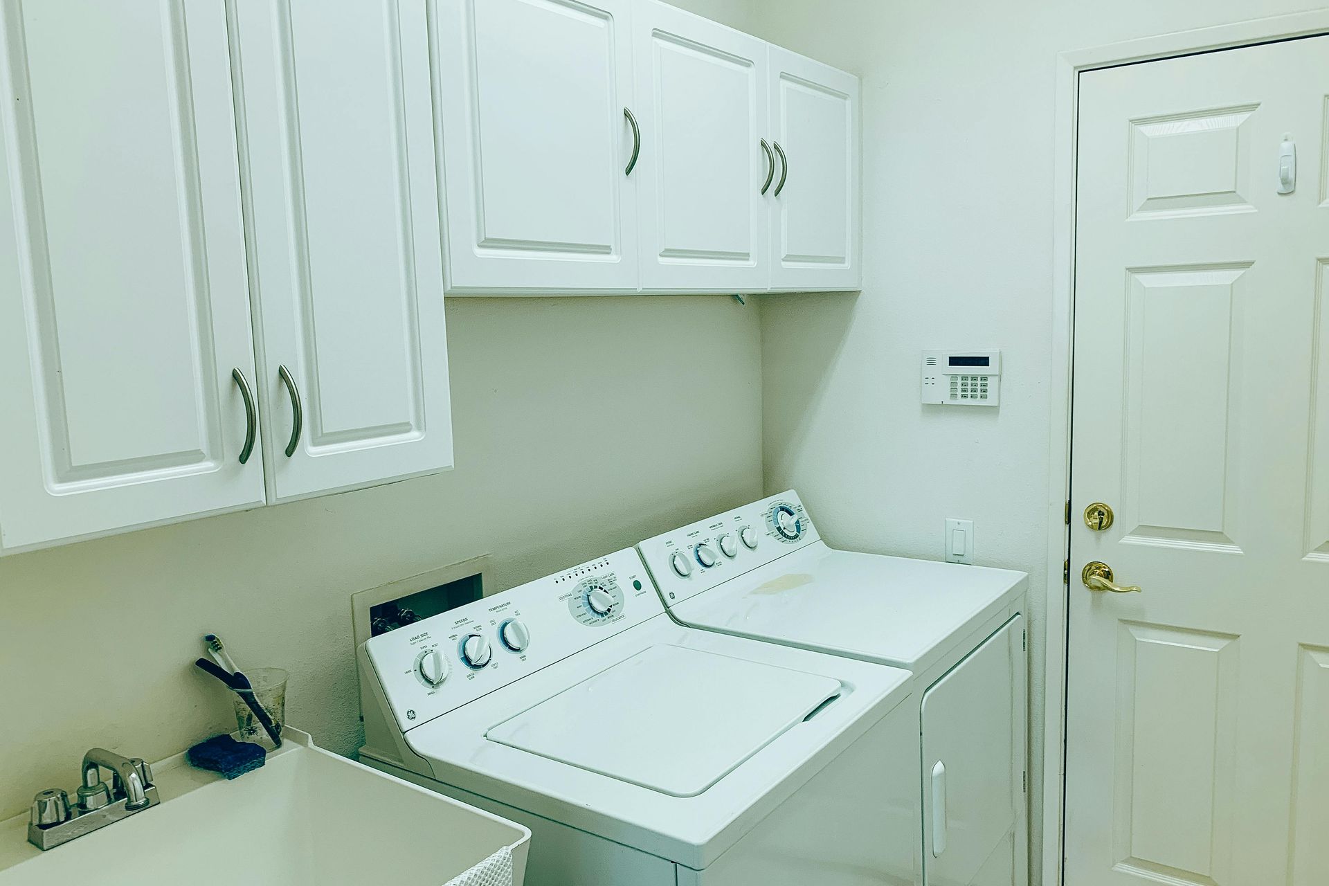 Modern laundry room setup with washer dryer needing repair consultation in Chicago 