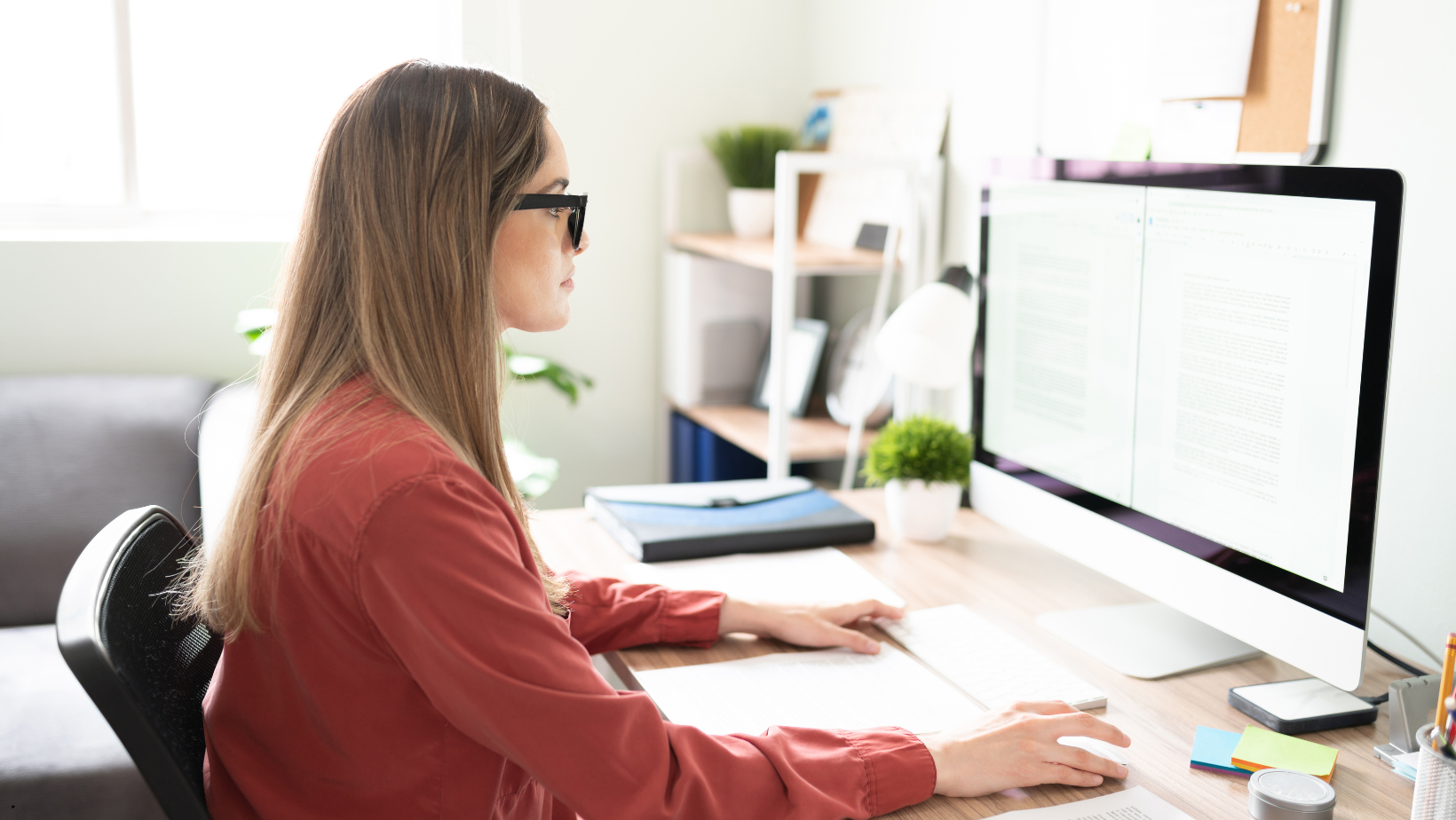 woman sitting in front of a computer
